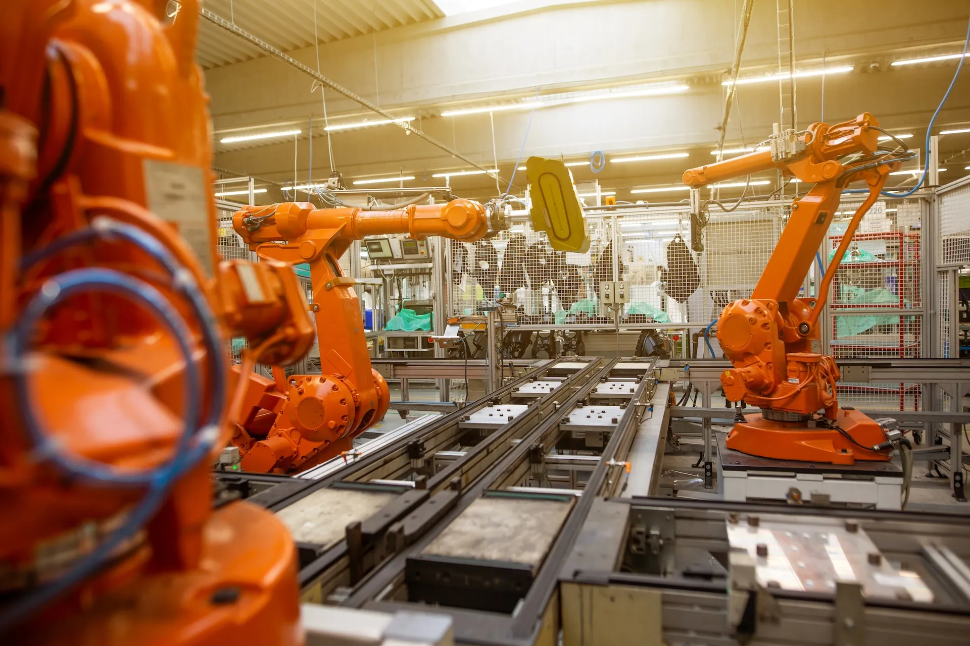 Factory utilizing robotic arms for automated processes